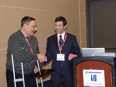 Dr. Matthew Zizmor - founder of the Kosher Dental Study Club - presenting Dr. Andrew Samuel with a plaque at the 1st Annual Lunch and Lecture at the Yankee Dental Congress 2014