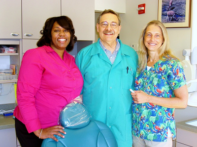 Dr. Matthew Zizmor with office manager Nakeeia and dental hygienist Liz