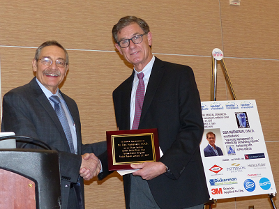 Dr. Zizmor presents Dr. Dan Nathanson a plaque for being the guest lecturer at our 4th Annual Kosher Dental Study Club lecture at the 2017 Yankee Dental Congress